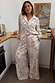 Cream Octopus Button Through Pyjamas featuring a nautical octopus print and relaxed fit in a kitchen setting.
