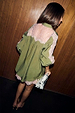 Olive and Pink Lace Marley Shirt with lace panels on the back and sleeves, styled with a monochrome clutch bag.