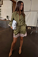 Olive and pink lace shorts in green satin with contrast lace trim, styled with a matching shirt and patterned clutch.