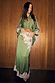 Olive & Pink Lily Skirt in olive satin with pink lace trim, styled as a co-ord with a matching shirt.