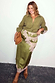 Olive & Pink Lily Skirt in olive satin with pink lace trim, styled as a midi with a matching shirt and brown heels.