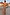 Thumbnail for Peach Paisley Ava Dress, a bias-cut maxi with an all-over print, worn by a model in a poolside vacation setting.