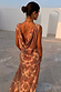 Peach Paisley Ava Dress featuring a low cowl back and bias-cut silhouette with an intricate all-over print.