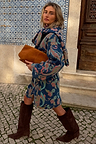 Longline Denim Paisley Belted Shacket in blue with a pink and green print, paired with brown boots on a tiled street.