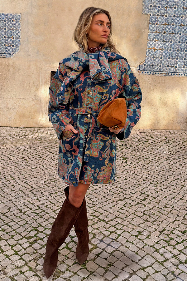 Blue Denim Paisley Belted Shacket with a vibrant print and waist belt, styled with brown suede boots.