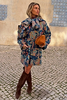 Blue Denim Paisley Belted Shacket with a vibrant print and waist belt, styled with brown suede boots.