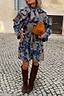 Thumbnail for Denim Paisley Belted Shacket in blue with a bright all-over print and cinched waist, styled with brown suede boots.