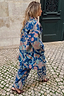 Blue Denim Paisley Belted Shacket and matching trousers with leopard heels on a London cobbled street.