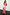 Thumbnail for Pink and red midi May Dress featuring sun and palm tree motifs, short puff sleeves and a V-neckline.