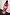 Thumbnail for Pink and Red May Dress with iconic sun and shell motifs, short puff sleeves and a shirred back detail on a model.