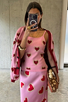 Pink Hearts Knit Tank with red heart prints, styled in a mirror selfie with a matching cardigan and skirt co-ord.