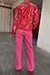Thumbnail for Pink Denim Scallop Detail Jeans with a wide-leg fit and scalloped pockets, paired with a sunburst print jumper.