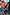 Thumbnail for Navy Pinstripe Arden Trousers and matching blazer styled with a graphic tee for a London street style look.