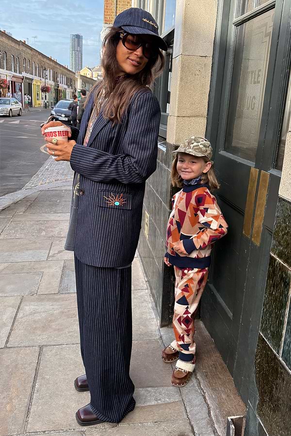 Petite Navy Pinstripe Arden Trousers and matching blazer styled for an iconic London look.