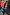 Thumbnail for Navy Pinstripe Arden Trousers styled with a matching blazer and graphic tee for a cool, smart-casual London look.