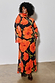 Thumbnail for Black Poppy Aria Mesh Dress with a red poppy print and long sleeves on a size 18 model for inclusive sizing.
