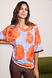 Blue Poppy Print Jersey Pyjamas featuring oversized orange poppies and leopard print accents in a soft stretch jersey.