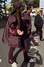 Thumbnail for Burgundy cotton wide leg pants with coral embroidery, styled with a leopard print gilet for a London look.