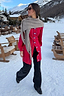 Thumbnail for Red Ski Knit Long Cardigan with light blue buttons and embroidered motifs, styled in a snowy mountain setting.