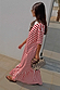 Red Stripe Jersey Dress in cotton featuring a bold red and white print and an asymmetric gathered skirt.
