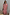 Thumbnail for Red Stripe Jersey Dress in cotton with a button neckline and asymmetric gathered skirt on a model.