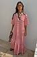 Red Stripe Jersey Dress in cotton with a button neckline and asymmetric gathered skirt on a model.