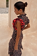 Cherry Leopard Remi midaxi dress with leopard print, red cherry frilled sleeves and a pleated neckline.