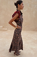 Cherry Leopard Remi Dress with pleated frills and a high neck, styled with matching leopard print heels.