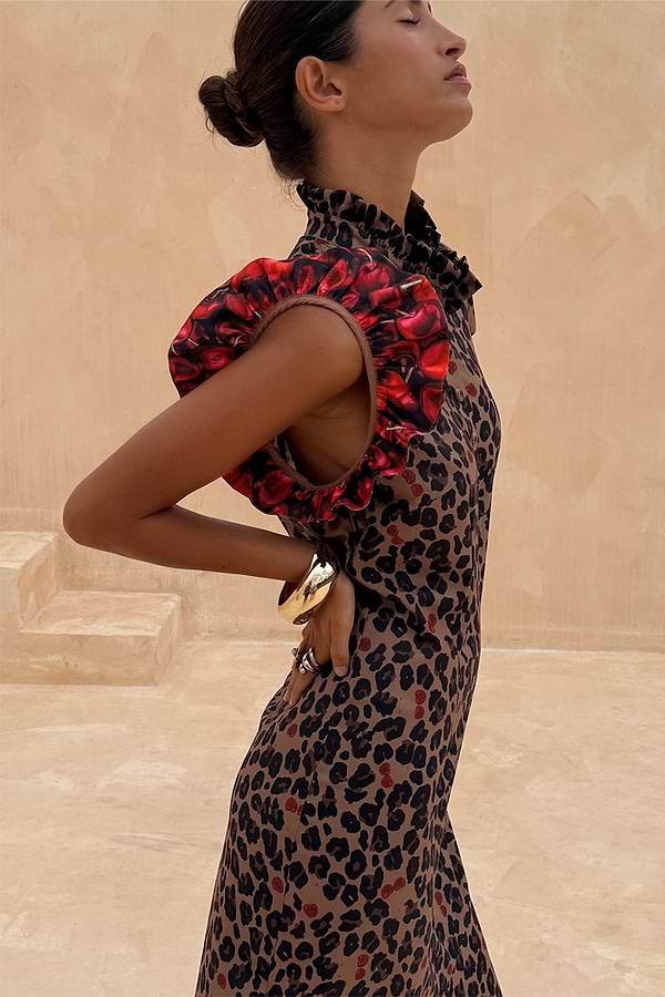 Cherry Leopard Remi Dress with pleated frill sleeves and neckline in the iconic leopard and cherry print.
