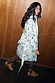 Belted Mono Swallow Romance Reversible Coat featuring a black tattoo-style print on white quilted fabric.