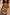 Thumbnail for Rio A-Symmetric Top in a vibrant fruit print with gathered waist detailing, worn by a model.