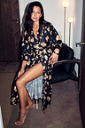 Deloris Satin Robe featuring gold hand and heart motifs on a black base with a waist tie fastening.