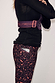 Leopard Running Bag in dark plum leopard print with Never Fully Dressed branded straps and matching leggings.