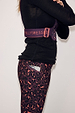 Leopard Running Bag in dark plum leopard print with Never Fully Dressed branded straps and matching leggings.