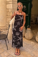 Black Seashell Mesh Cami Dress with a white starfish print, styled for a vacation with a shell necklace.