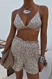 Silver Sequin Shorts with a relaxed fit and elasticated waist, paired with a matching sequin bikini top.
