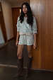 Silver Sequin Shorts and matching jacket co-ord styled with brown knee-high boots.