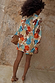 Shell Marley Shirt in a multi-coloured abstract shell print with metallic gold detailing, shown from the back.