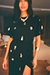 Thumbnail for Black Shell Midi Leia Dress with a gold shell print, featuring a t-shirt bodice and wrap tie skirt.