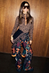 Night Garden Ski Suit with leopard and mystical motifs, tied at the waist over a leopard print base layer.