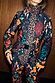 Night Garden Ski Suit featuring a patchwork of leopard, poppy and bandana motifs with a belted waist and high neck.