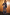 Thumbnail for Night Garden Ski Suit with leopard and mystical motifs, featuring a belted waist and styled with orange visor goggles.