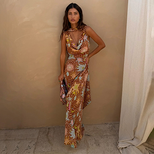 Brown Star Fawn Sophie Dress featuring a celestial print, draped front and multi-wear scarf detail.