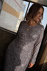 Gunmetal Sequin Soho Dress featuring long sleeves and a body-skimming silhouette covered in grey sequins.