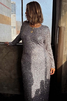 Gunmetal Sequin Soho Dress featuring shimmering grey sequins and long sleeves in a body-skimming silhouette.