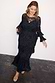 Thumbnail for Black Star Devore Felicity Dress with tiered ruffles and velvet star motifs, worn by a size 18 model.