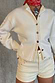 Thumbnail for Ecru Studded Cardigan featuring silver studs and twist stitch detailing, worn with matching cream shorts.