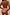 Thumbnail for Orange Sun High Waist Bikini Brief featuring iconic sun motifs and gold logo detail, seen from the back.