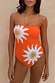 Orange Sun Bandeau Swimsuit featuring white Soleil sun motifs and gold bead embroidery.