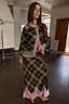 Olive Tartan Maeva midi skirt featuring a contrast pink lace hem and matching knit cardigan, designed in London.